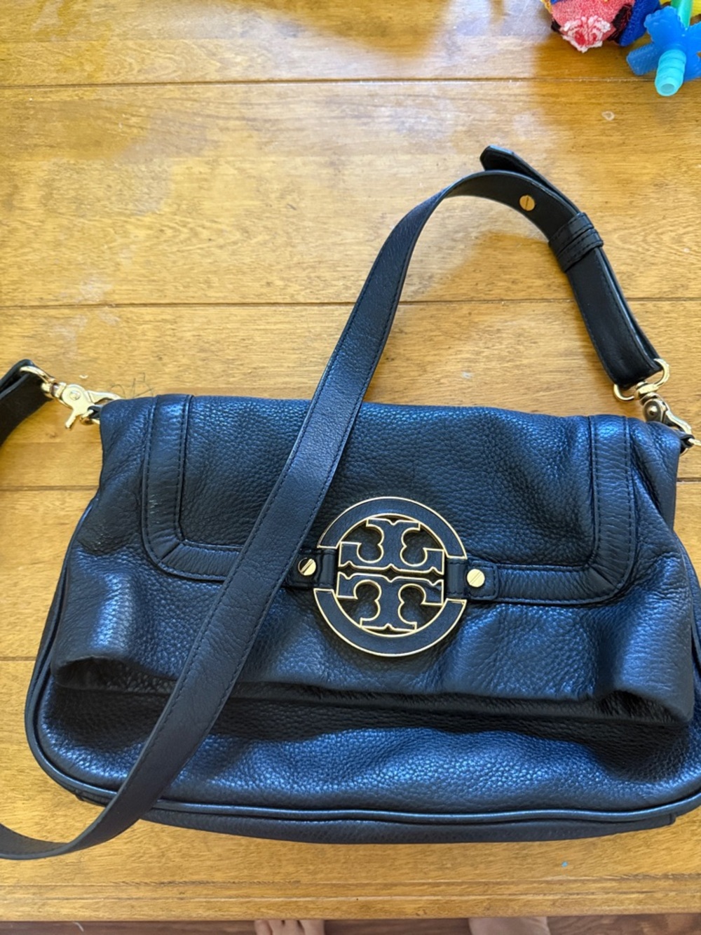 Tory Burch Black Pebbled Leather Shoulder Bag with Gold Logo Medallion